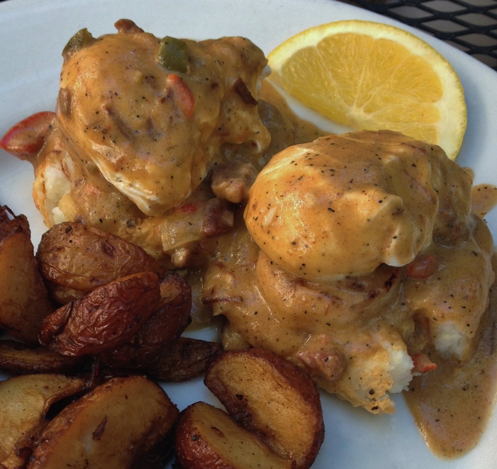 Shrimp and Grit Benedict with breakfast potatoes
