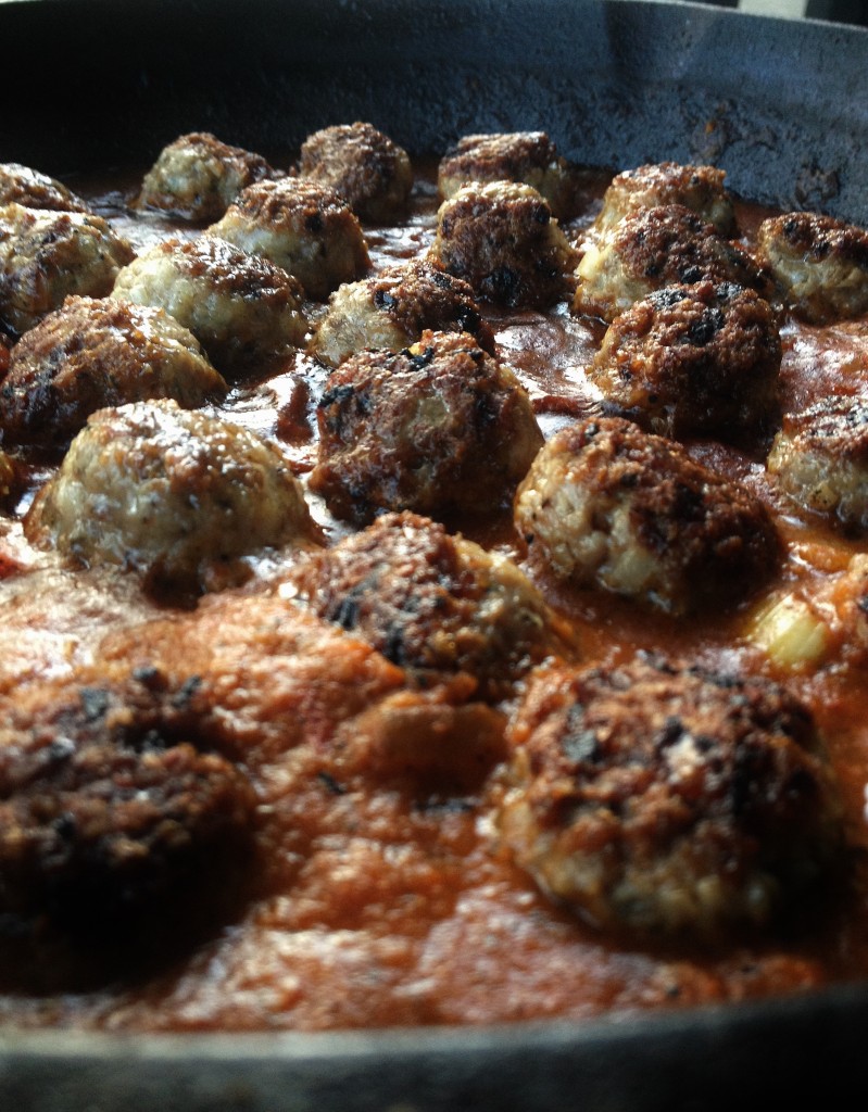 Close up meatballs with veggie sauce for mopping