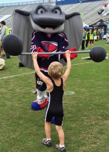 The Strongest Man in the World faces off with The Charleston Stingrays mascot