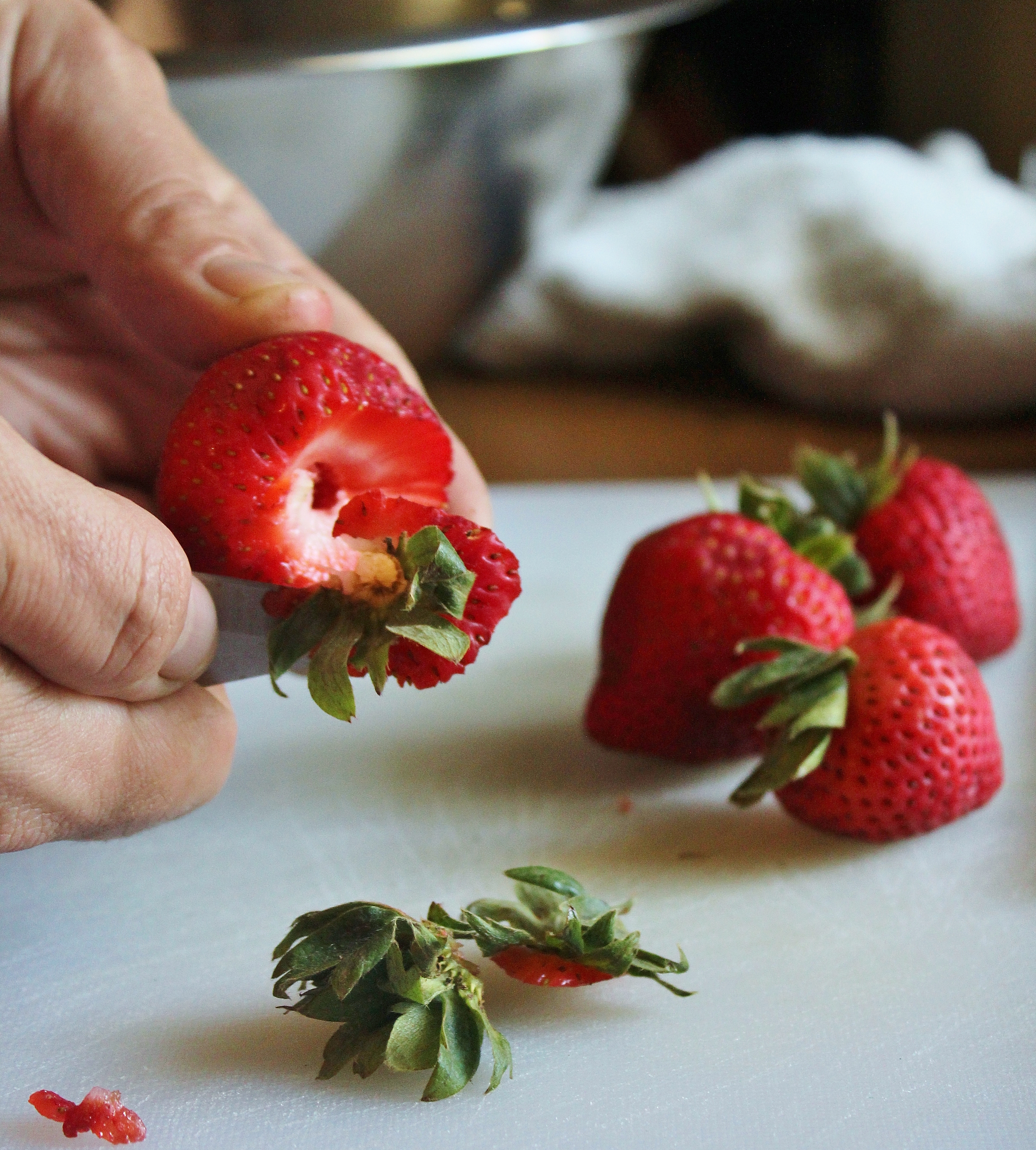 hulling the strawberries