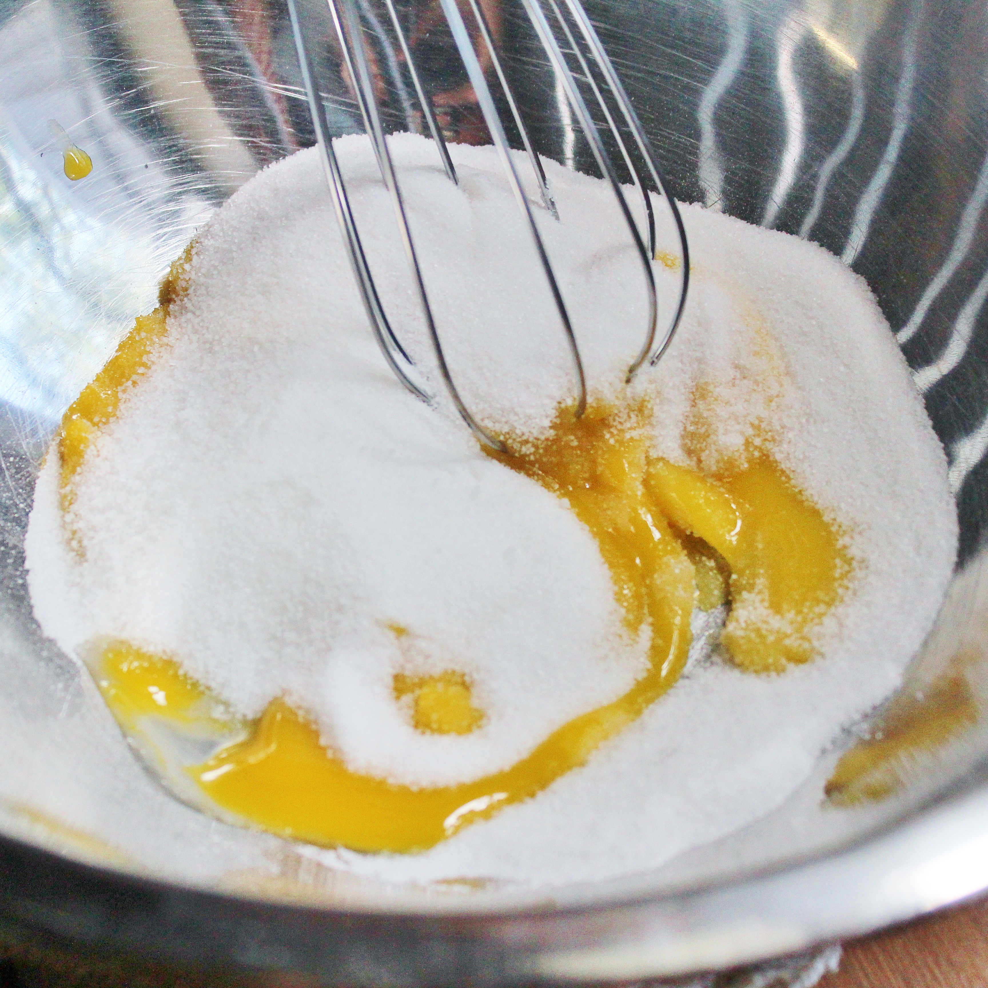 mixing the sugar and eggs