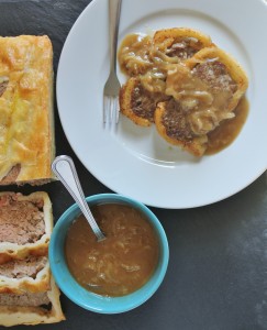 forcemeat in pastry dough with onion sauce
